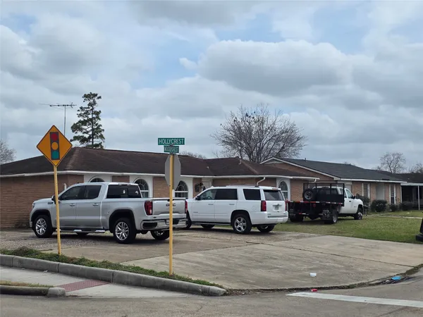 a car parked in front of a house