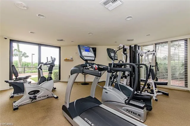 a view of a room with gym equipment