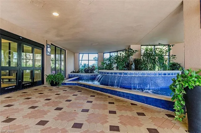 a view of balcony with a yard