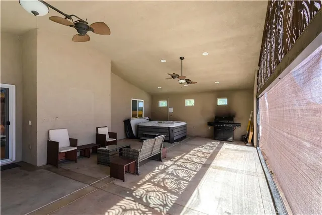 a lobby with furniture and a rug