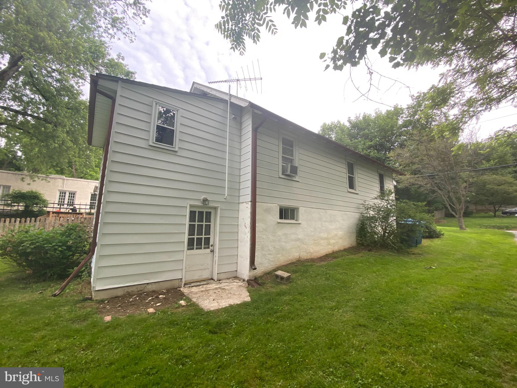 959 Radnor Road Wayne, PA 19087 - Photo 4 of 35 Side of house with door to lower level