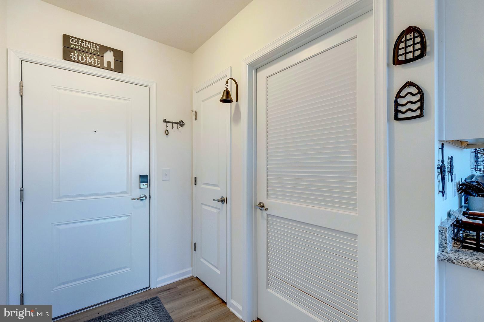 20141 Riesling Lane Lewes, DE 19958 - Photo 4 of 36 Unit entrance with coat & laundry closets