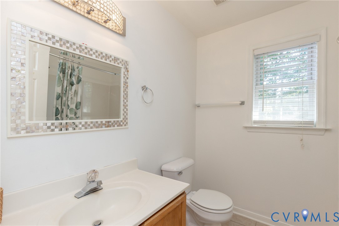 5101 Spring Bluff Road Midlothian, VA 23112 - Photo 37 of 47 Bathroom vanity with a white countertop and integr
