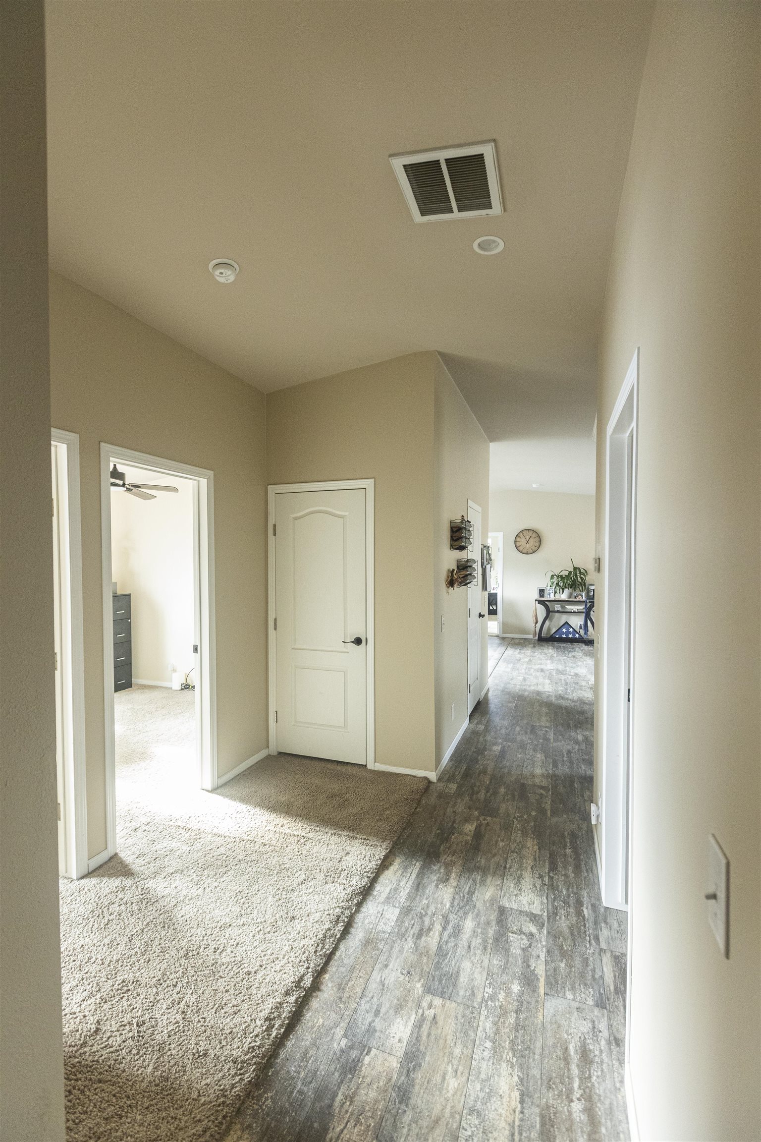 2432 Pioneer Way Rifle, CO 81650 - Photo 12 of 31 a view of a hallway to a room and a livingroom