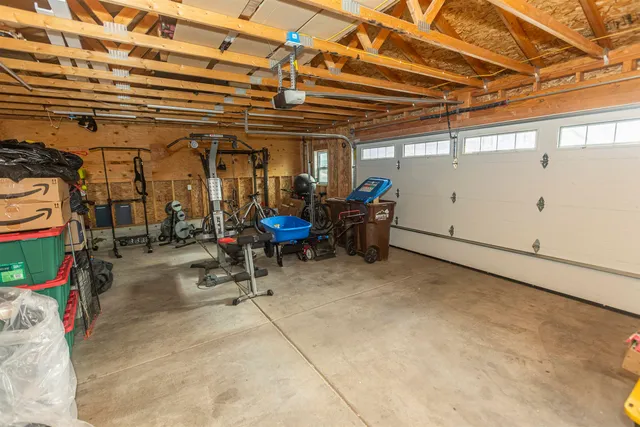a gym room with lots of gym equipment