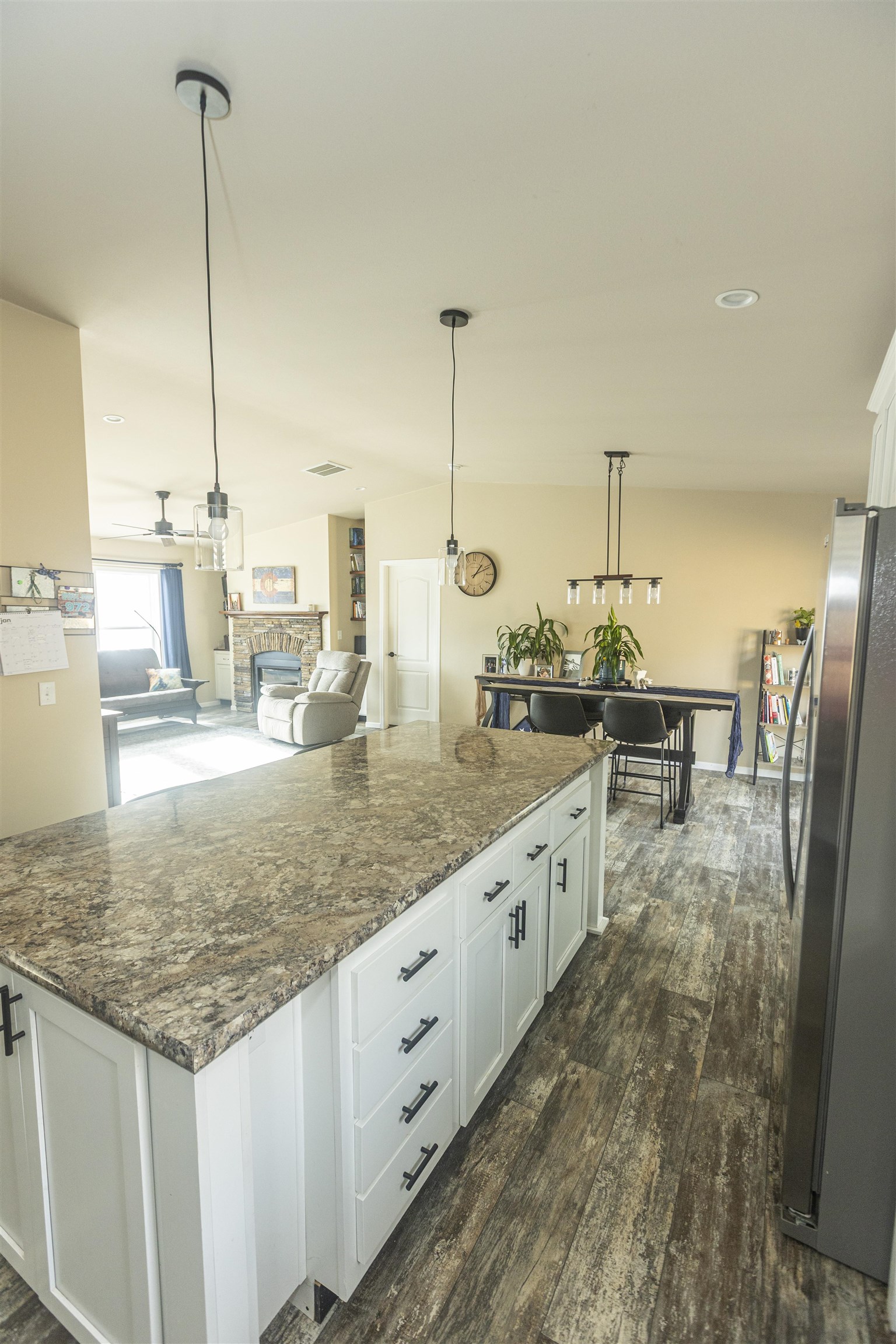 2432 Pioneer Way Rifle, CO 81650 - Photo 10 of 31 a kitchen with sink refrigerator and stove