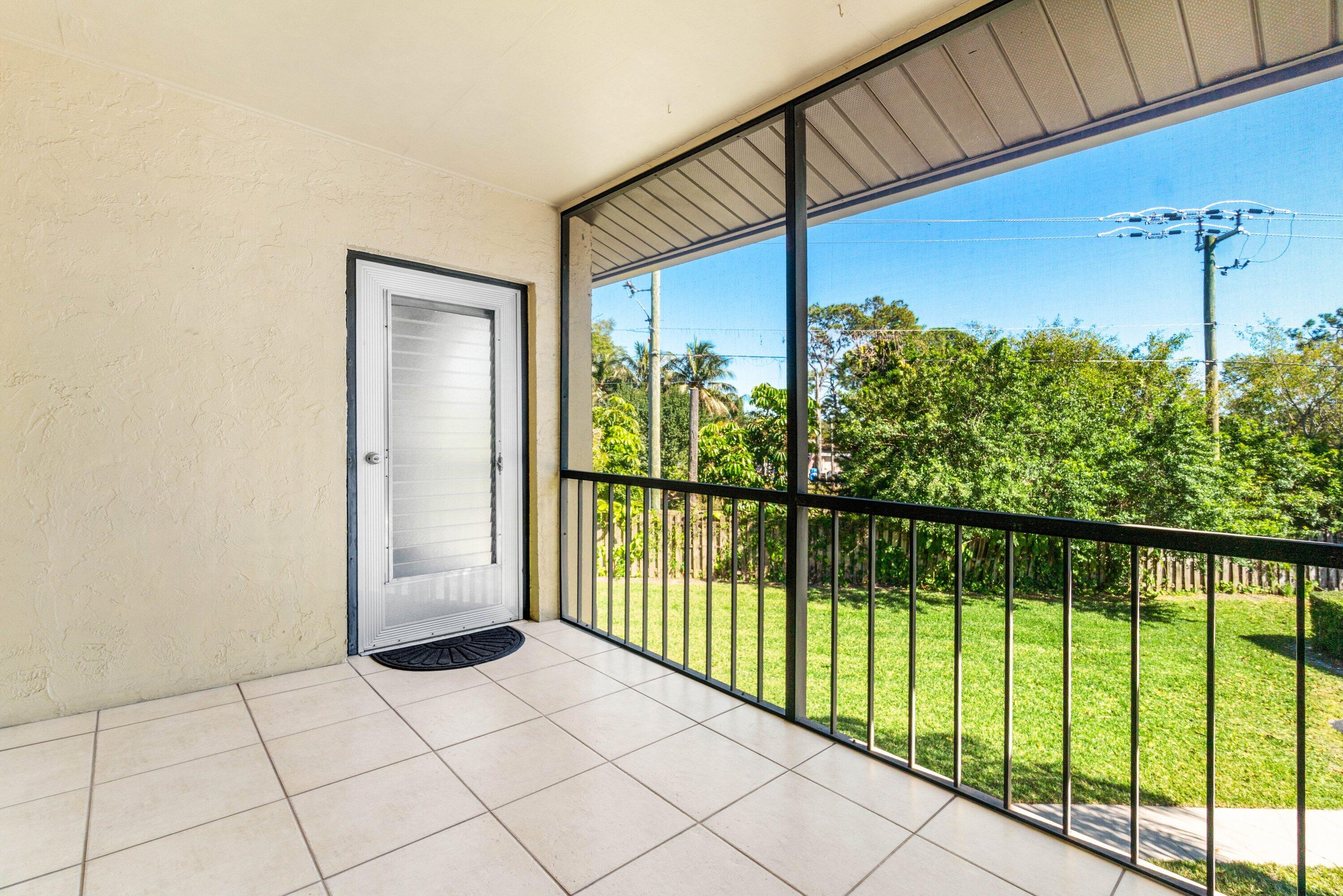 322 Pine Ridge Circle, Unit A2 Greenacres, FL 33463 - Photo 24 of 26 a view of a balcony