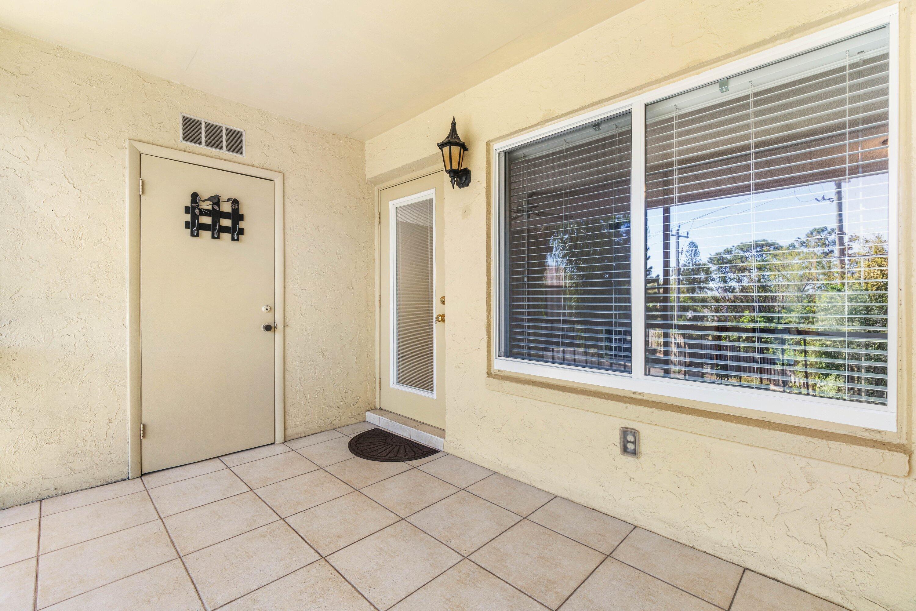 322 Pine Ridge Circle, Unit A2 Greenacres, FL 33463 - Photo 26 of 26 a view of an empty room and window