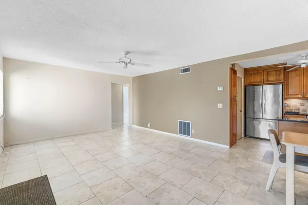 a view of a livingroom with furniture and a couch