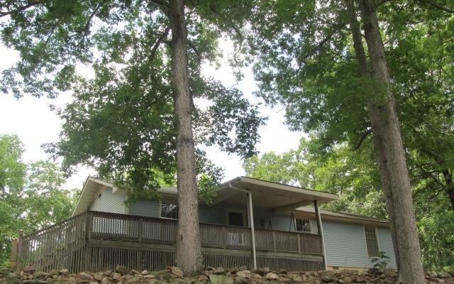 4076 Bartley Road West Point, GA 31833 - Photo 1 of 1 a backyard of a house with lots of trees