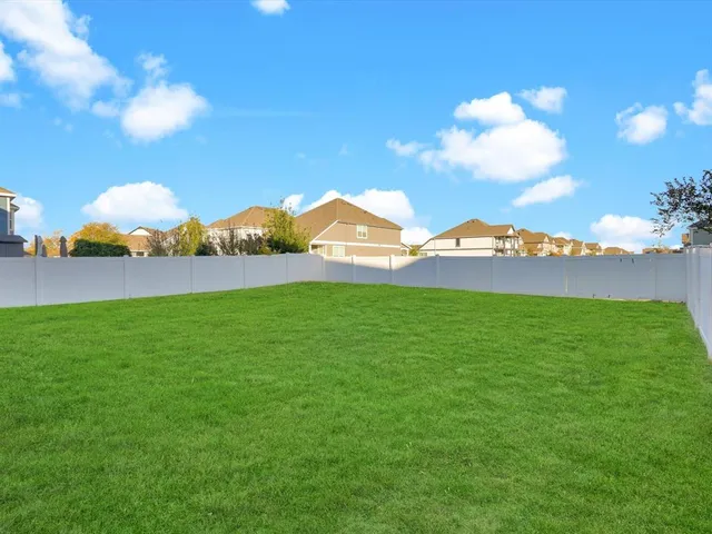 a view of a field and a yard