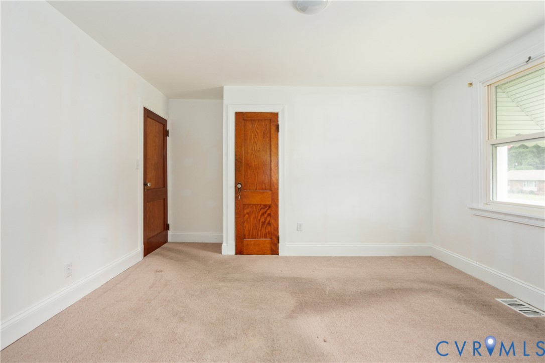 4000 Wayside Road Charles City, VA 23030 - Photo 12 of 30 Light-filled room featuring neutral wall paint, tw