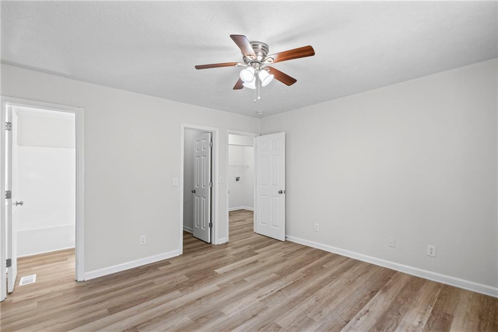 764 Chestnut Cove Trail Jasper, GA 30143 - Photo 23 of 44 a view of an empty room and wooden floor