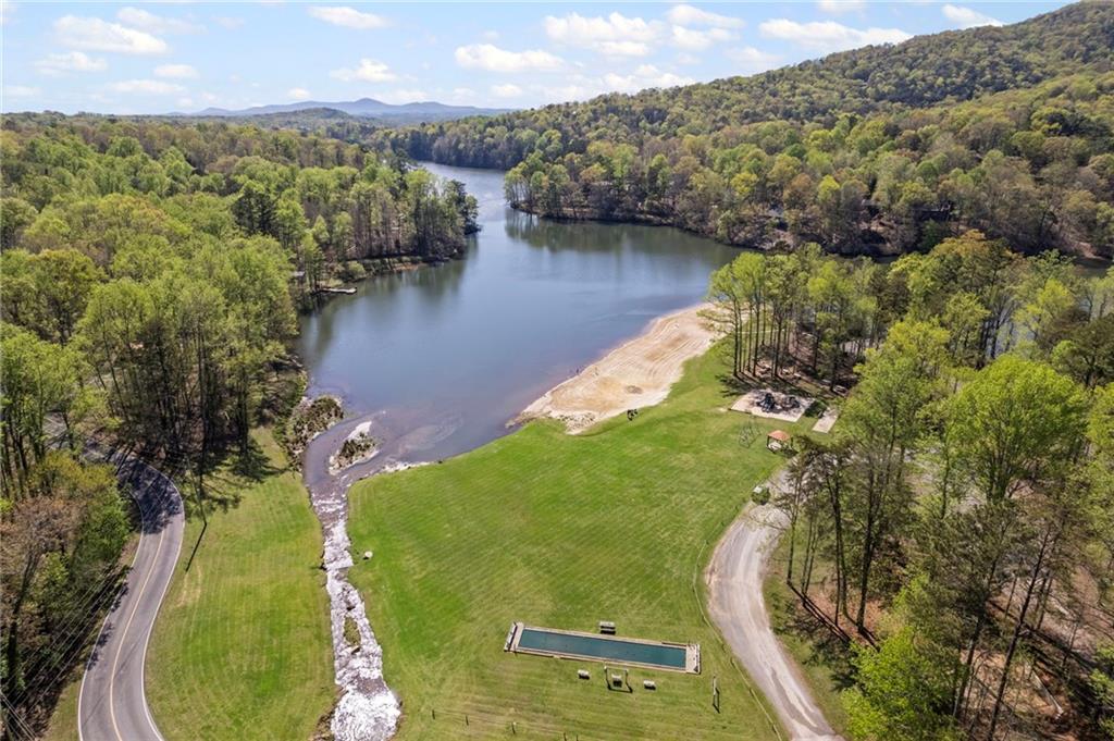764 Chestnut Cove Trail Jasper, GA 30143 - Photo 3 of 44 an aerial view of a house with a yard and lake view