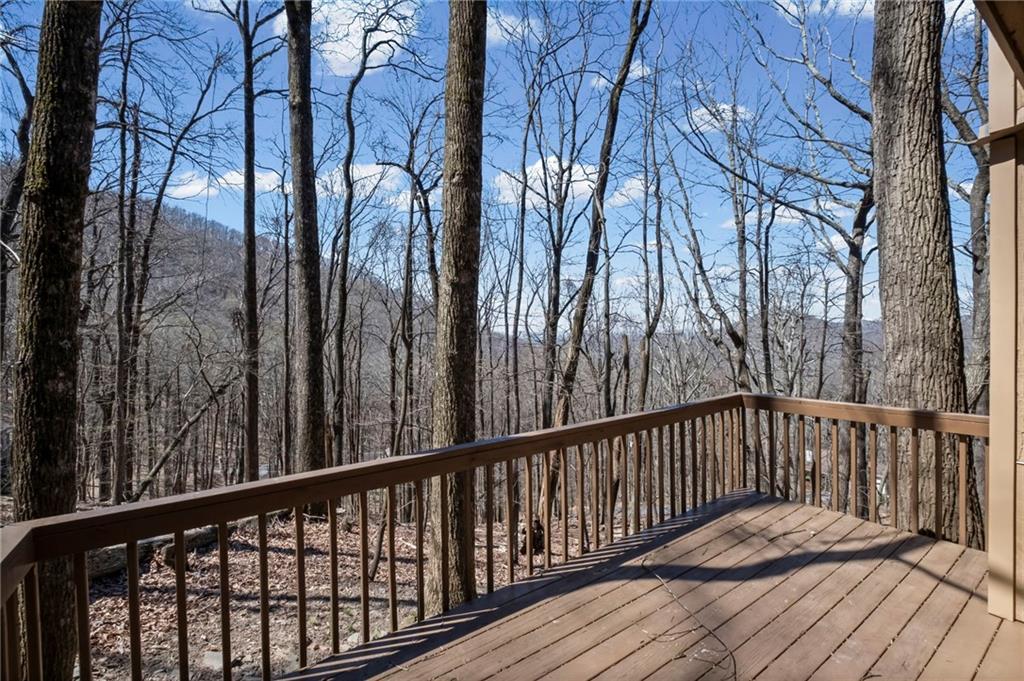 764 Chestnut Cove Trail Jasper, GA 30143 - Photo 4 of 44 a view of balcony with wooden floor and fence