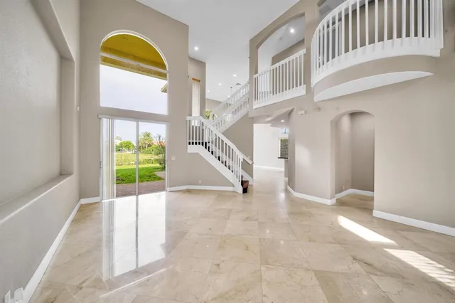 a view of an entryway with staircase