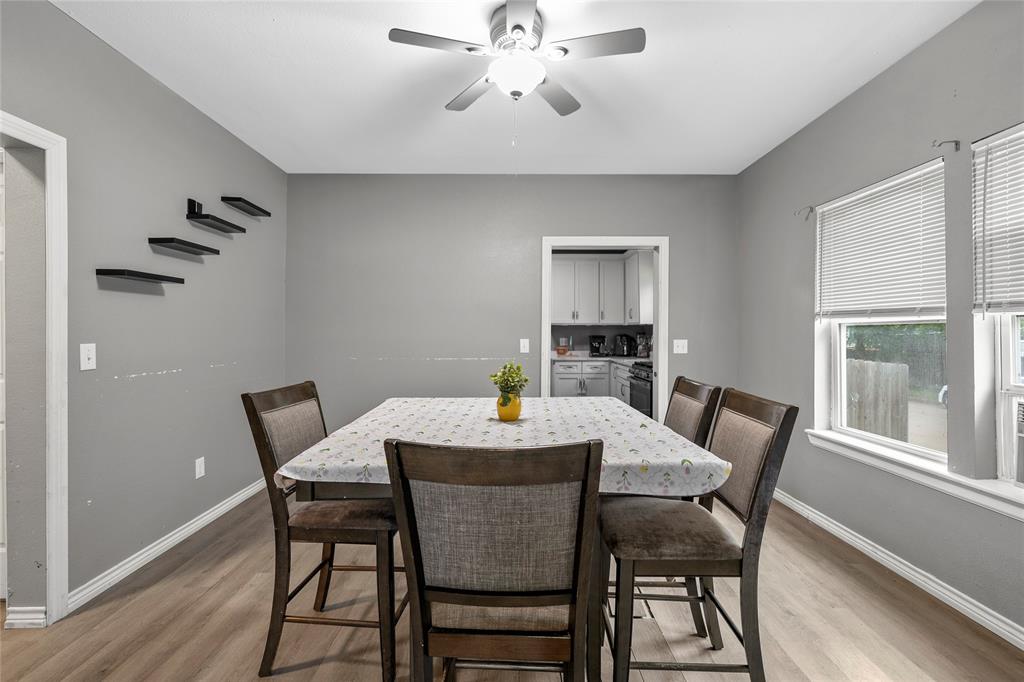 2301 Herring Avenue Waco, TX 76708 - Photo 6 of 14 a view of a dining room with furniture window and wooden floor