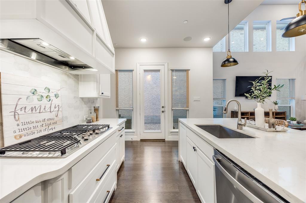 1036 Drew Lane Allen, TX 75013 - Photo 11 of 38 a kitchen with a sink stove and cabinets