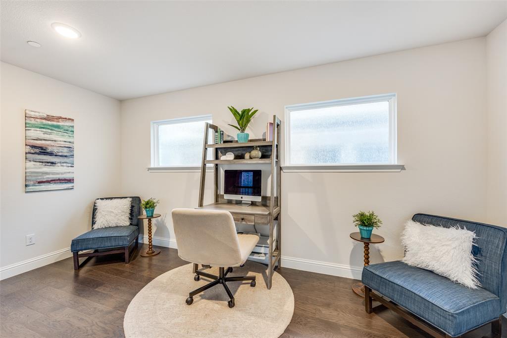 1036 Drew Lane Allen, TX 75013 - Photo 23 of 38 a living room with furniture and a potted plant