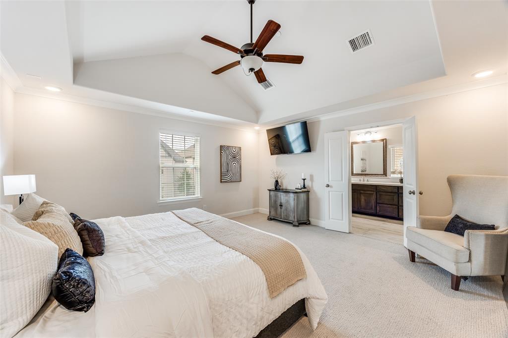 1036 Drew Lane Allen, TX 75013 - Photo 25 of 38 a bedroom with a bed furniture and ceiling fan