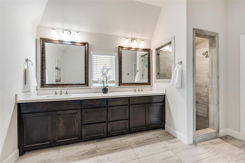 1036 Drew Lane Allen, TX 75013 - Photo 28 of 38 a bathroom with a double vanity sink mirror and