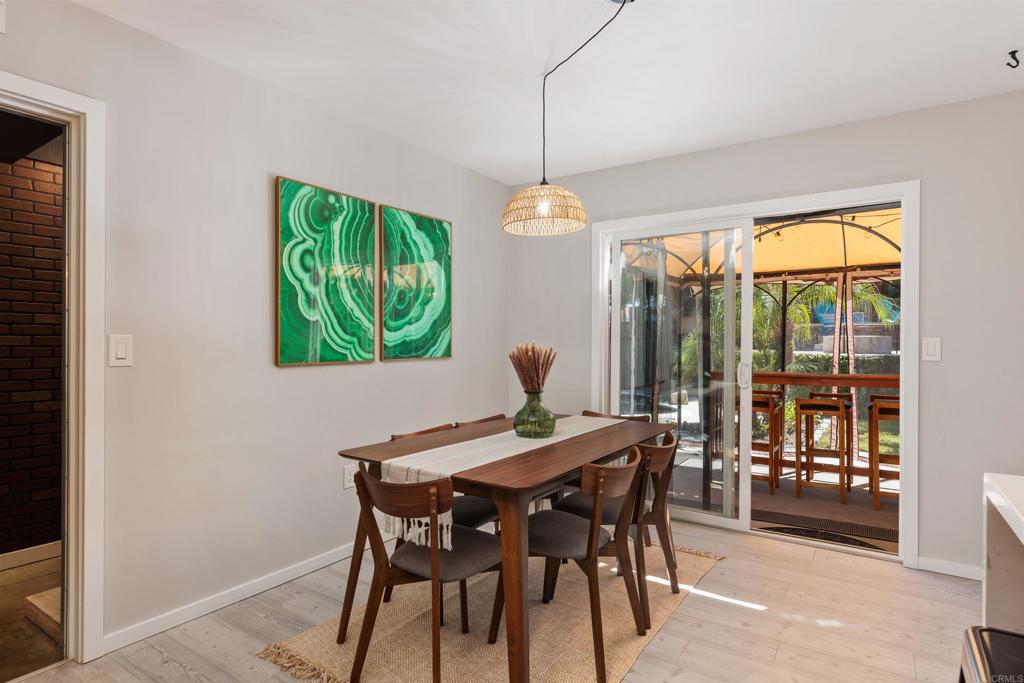 4180 Galbar Place Oceanside, CA 92056 - Photo 11 of 41 a view of a dining room with furniture window and outside view
