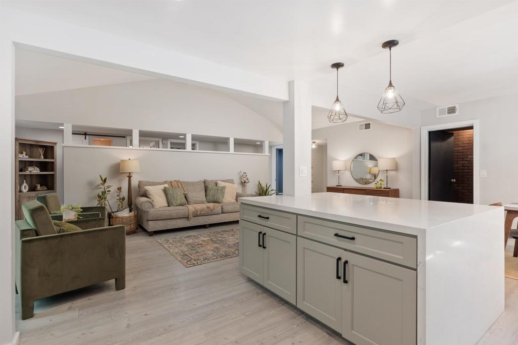4180 Galbar Place Oceanside, CA 92056 - Photo 15 of 41 a living room with furniture and kitchen view