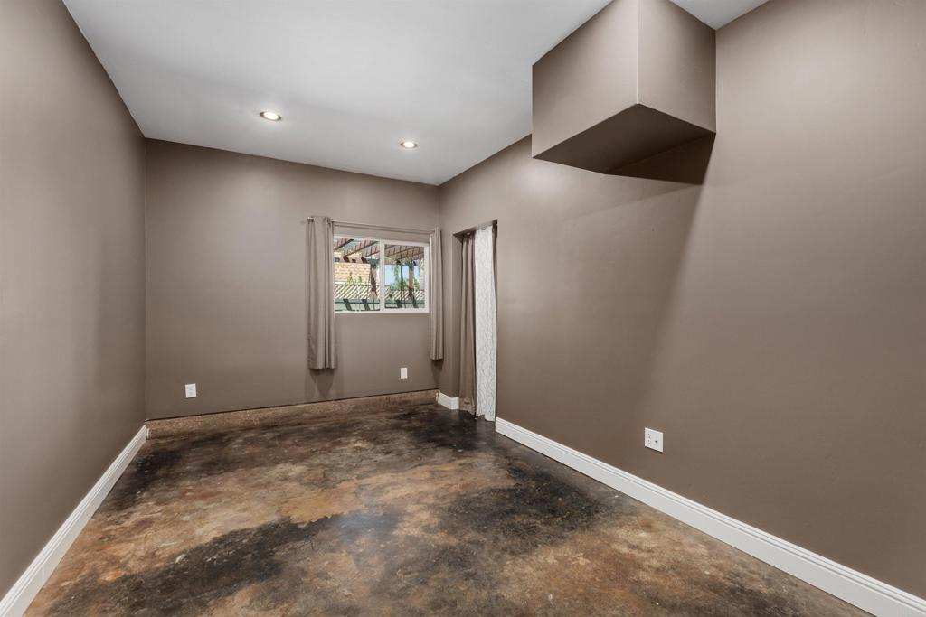 4180 Galbar Place Oceanside, CA 92056 - Photo 23 of 41 an empty room with windows