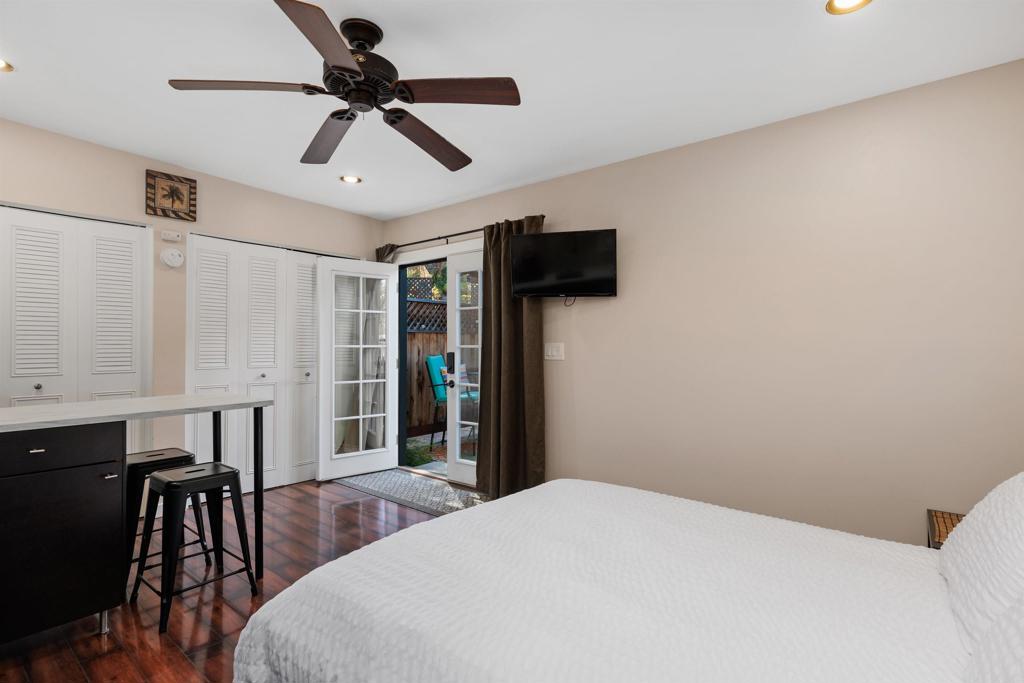 4180 Galbar Place Oceanside, CA 92056 - Photo 29 of 41 a bedroom with a bed a desk and chair