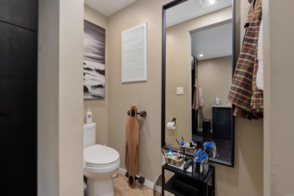 4180 Galbar Place Oceanside, CA 92056 - Photo 35 of 41 a bathroom with a sink toilet and shower