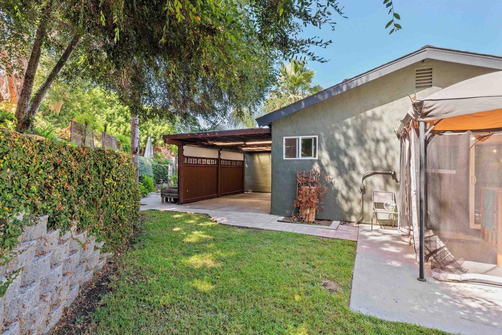 4180 Galbar Place Oceanside, CA 92056 - Photo 40 of 41 a view of a house with backyard and a tree