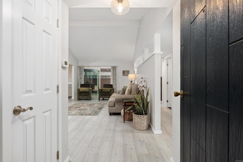 4180 Galbar Place Oceanside, CA 92056 - Photo 6 of 41 a view of a livingroom with furniture and hardwood floor