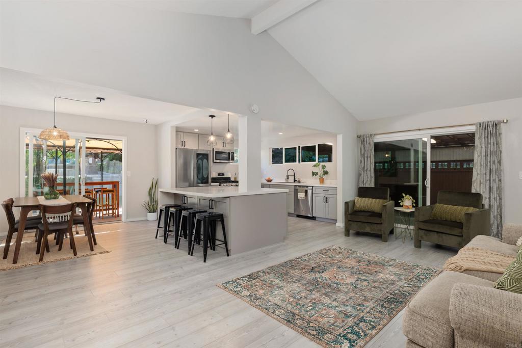 4180 Galbar Place Oceanside, CA 92056 - Photo 8 of 41 a living room with furniture and a rug
