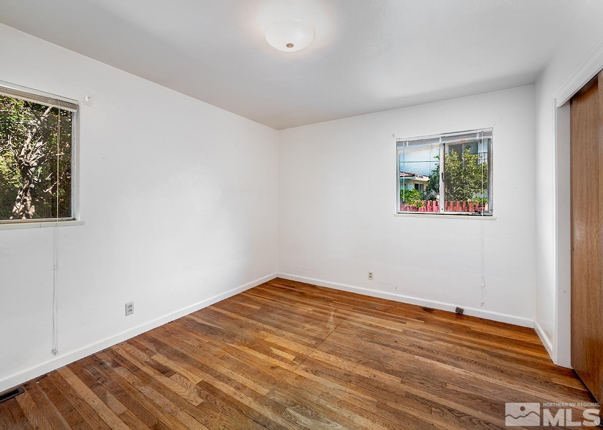 735 Brookfield Drive Reno, NV 89503 - Photo 11 of 23 a view of empty room with wooden floor