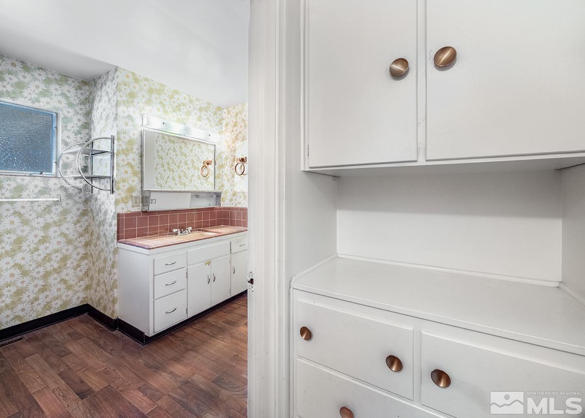 735 Brookfield Drive Reno, NV 89503 - Photo 12 of 23 a bathroom with a sink and a mirror