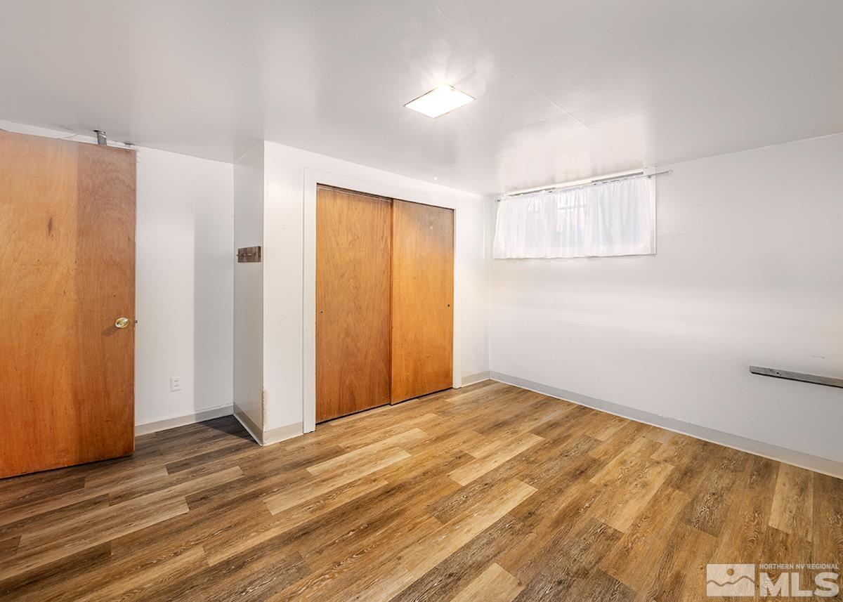 735 Brookfield Drive Reno, NV 89503 - Photo 18 of 23 a view of empty room with wooden floor