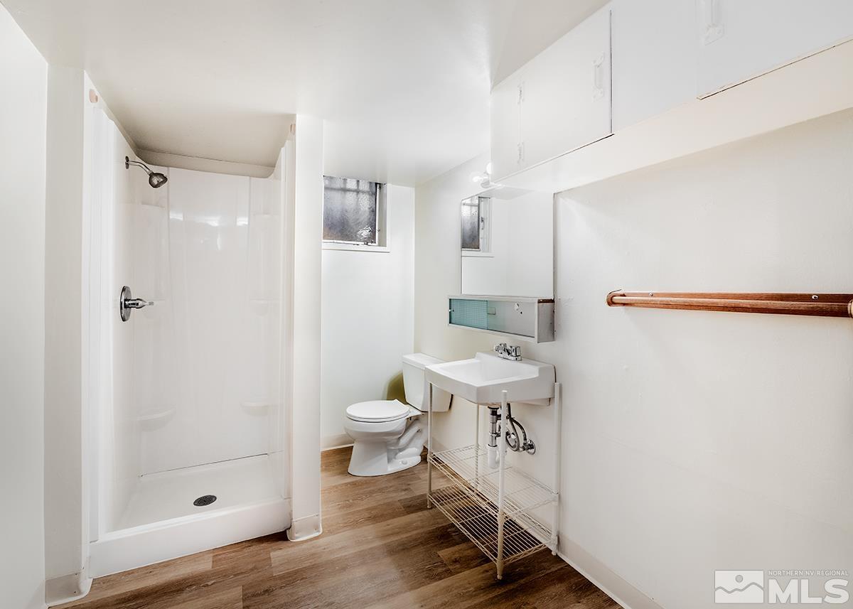 735 Brookfield Drive Reno, NV 89503 - Photo 19 of 23 a bathroom with a toilet a sink and shower