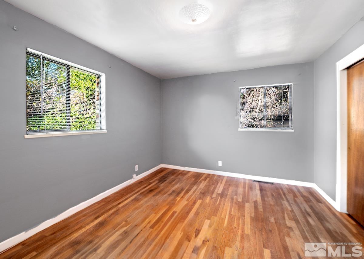 735 Brookfield Drive Reno, NV 89503 - Photo 10 of 23 a view of empty room with wooden floor