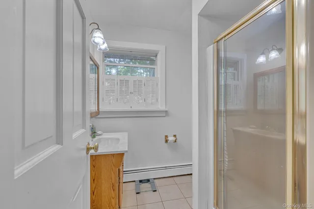 a bathroom with a mirror