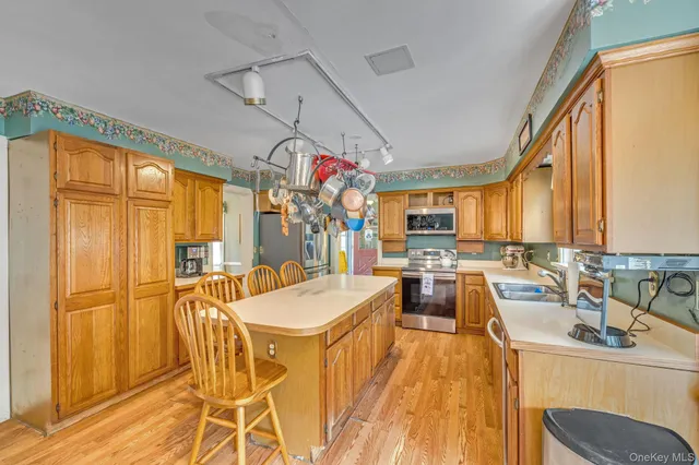 a very nice looking dining room with a large window