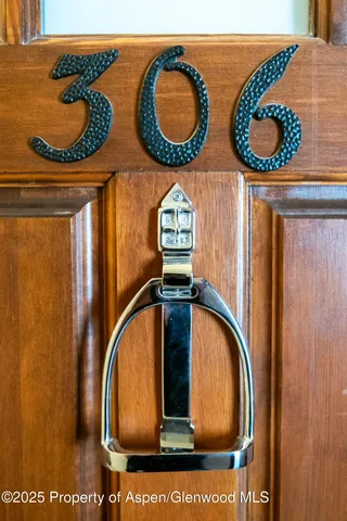 a couple of appliances sitting on a floor in front of a door