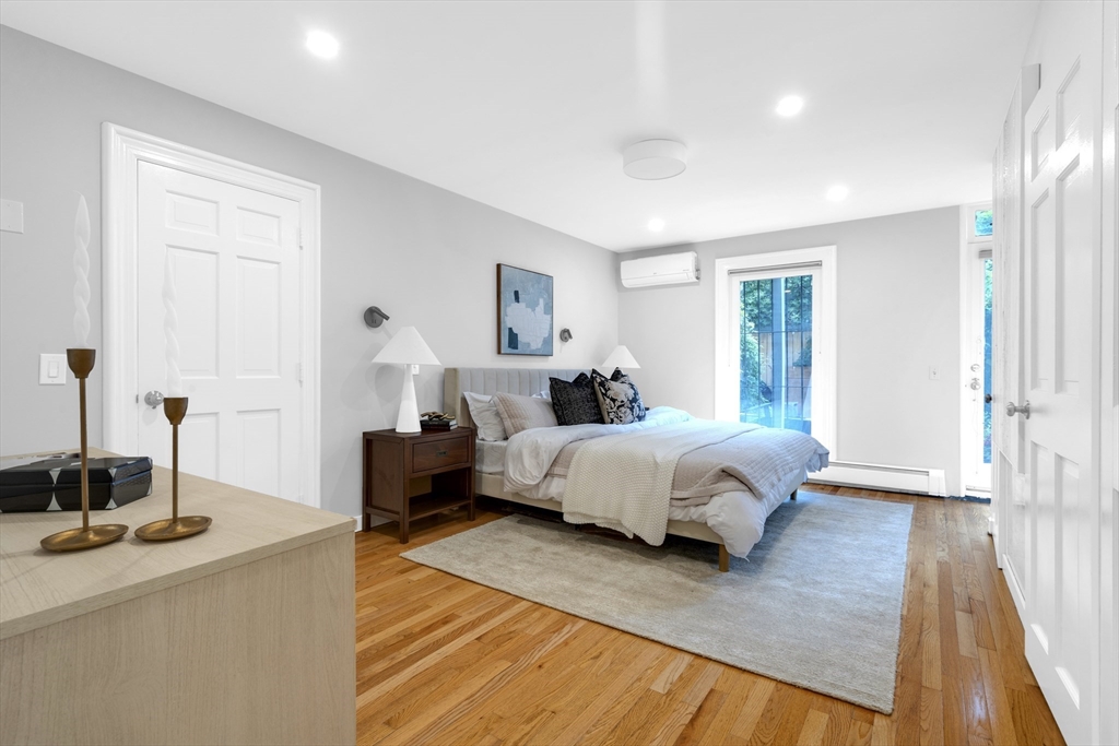 72 Rutland Street, Unit 1 Boston, MA 02118 - Photo 12 of 29 a spacious bedroom with a bed and a table