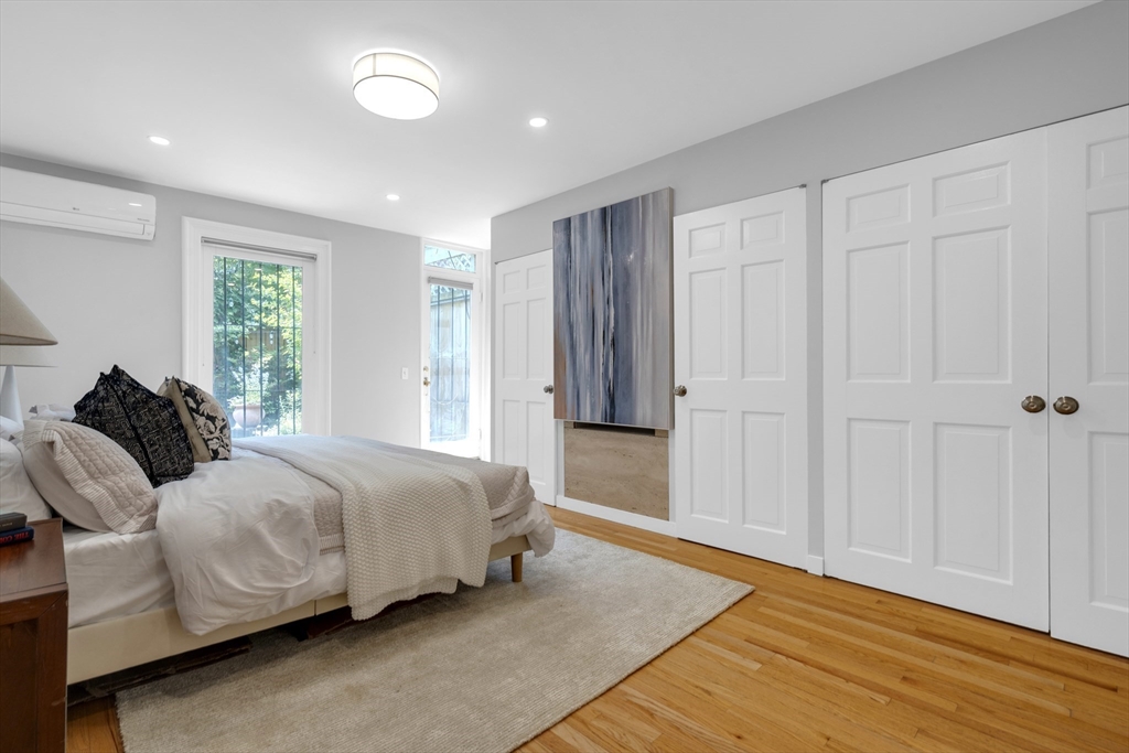 72 Rutland Street, Unit 1 Boston, MA 02118 - Photo 13 of 29 a spacious bedroom with a bed and a window