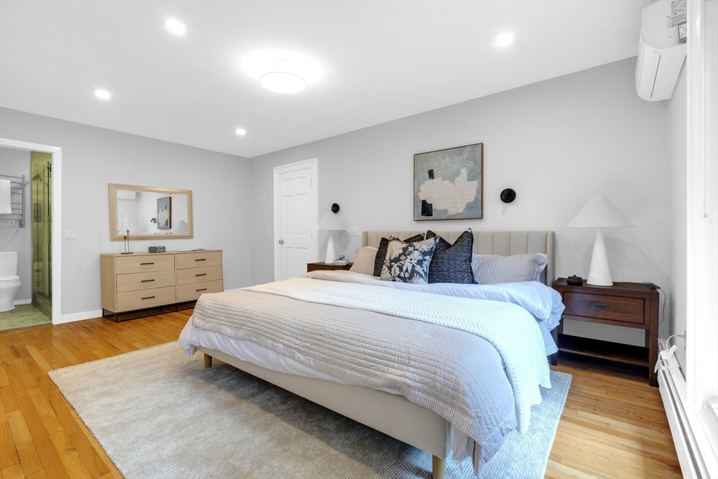 72 Rutland Street, Unit 1 Boston, MA 02118 - Photo 14 of 29 a bedroom with a bed and a couch