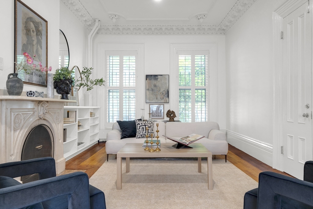 72 Rutland Street, Unit 1 Boston, MA 02118 - Photo 2 of 29 a living room with furniture fireplace and window
