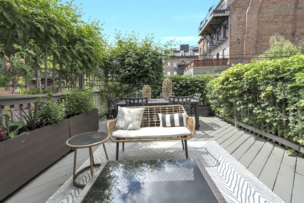 72 Rutland Street, Unit 1 Boston, MA 02118 - Photo 21 of 29 a view of a chairs and table on the balcony