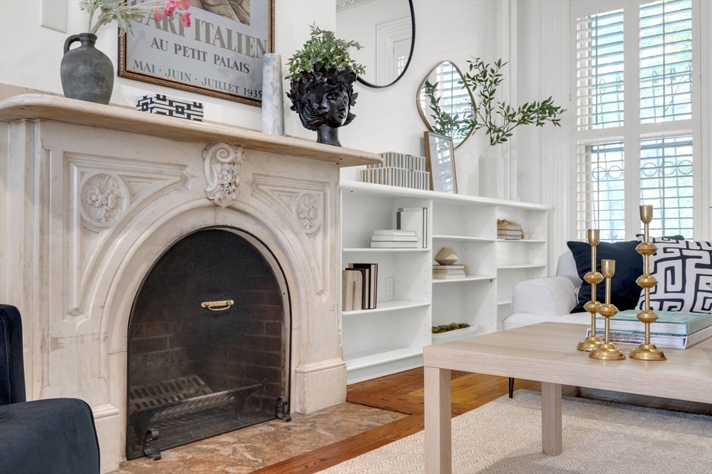 72 Rutland Street, Unit 1 Boston, MA 02118 - Photo 4 of 29 a living room with furniture a fireplace and decor