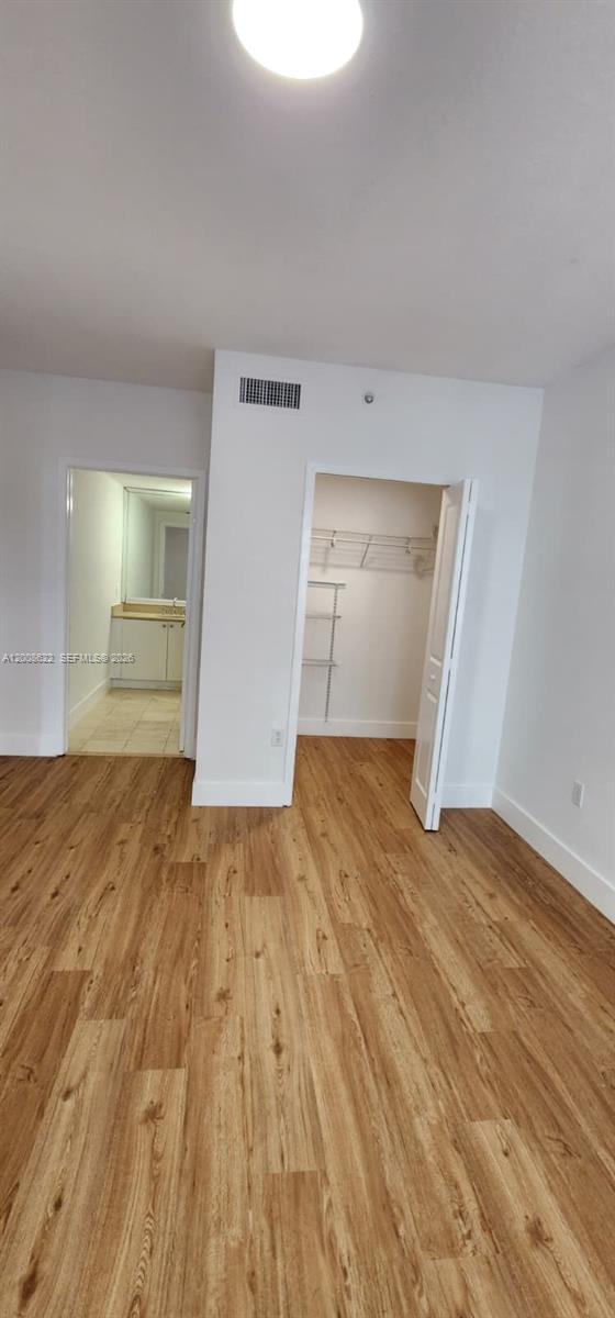 170 Southeast 14th Street, Unit 1408 Miami, FL 33131 - Photo 15 of 30 wooden floor in an empty room