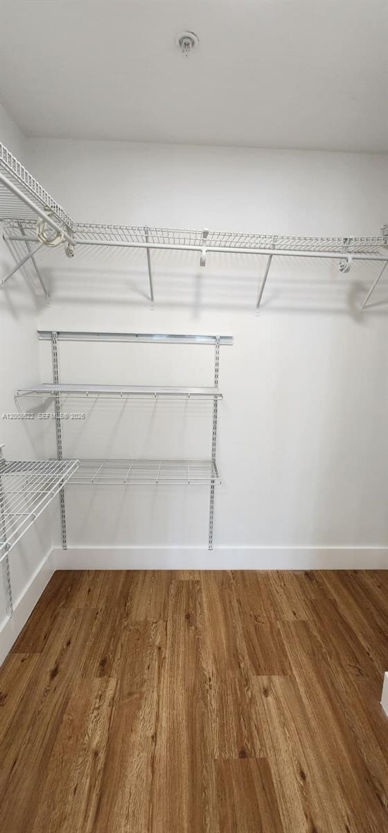 170 Southeast 14th Street, Unit 1408 Miami, FL 33131 - Photo 16 of 30 a view of a room with racks on the wall