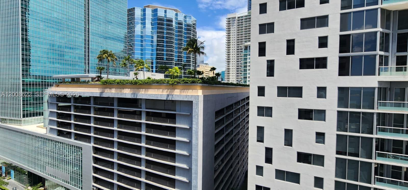 170 Southeast 14th Street, Unit 1408 Miami, FL 33131 - Photo 18 of 30 a view of tall building with a window